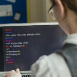 Female Student Learning Coding In School
